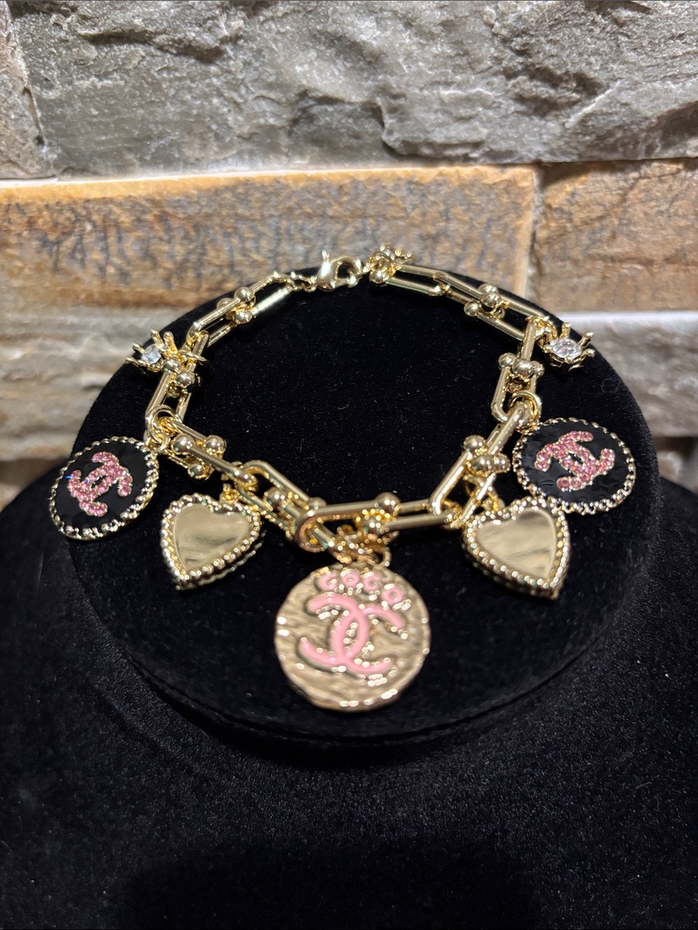 Gold plated Charm Bracelet with Pink Accents